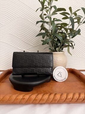 Gucci Black Embossed Logo Clutch